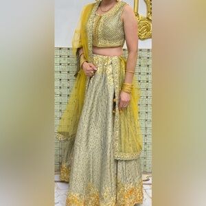 Beautiful embroidery lehenga in pistachio and light yellow color